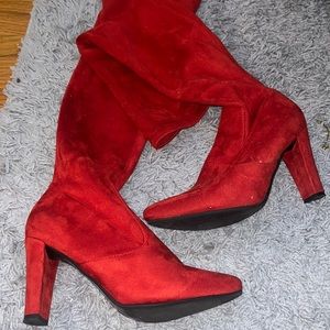 Red knee high boots worn once